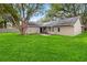 A beautiful backyard provides ample space for outdoor activities, relaxation, and entertainment at 5003 Timber Ridge Trl, Ocoee, FL 34761