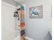 Bathroom featuring a white tub, shower, and turtle-themed artwork on the wall at 5003 Timber Ridge Trl, Ocoee, FL 34761