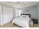Bright bedroom featuring neutral walls, large closet, and unique ceiling lighting to create a cozy atmosphere at 5003 Timber Ridge Trl, Ocoee, FL 34761