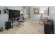 A bright bedroom with desk, decorations, and a big window creates a conducive environment for work at 5003 Timber Ridge Trl, Ocoee, FL 34761