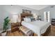 Relaxing main bedroom featuring a bed with stylish wood details at 5003 Timber Ridge Trl, Ocoee, FL 34761