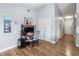 Office nook with wood floors, neutral paint, and closet for storage at 5003 Timber Ridge Trl, Ocoee, FL 34761
