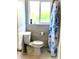 Bathroom with a shower/tub combination and a matching toilet and sink at 902 S Scenic Hwy, Lake Wales, FL 33853