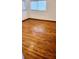 Spacious bedroom with hardwood floors and ample natural light at 902 S Scenic Hwy, Lake Wales, FL 33853