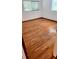 Bright bedroom with hardwood floors and natural light from large windows at 902 S Scenic Hwy, Lake Wales, FL 33853