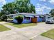 Well-maintained home with a lawn and driveway at 902 S Scenic Hwy, Lake Wales, FL 33853