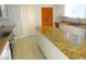 Updated kitchen featuring an island and stainless steel appliances at 902 S Scenic Hwy, Lake Wales, FL 33853