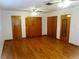 This main bedroom features multiple closets, hardwood floors and lots of space at 902 S Scenic Hwy, Lake Wales, FL 33853