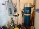 Basement utility area showcasing electrical panel, Auto-Maid vacuum system, and other mechanicals at 246 Ridge Manor Dr, Lake Wales, FL 33853