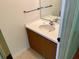Bathroom vanity with solid surface countertop, sink and mirror at 246 Ridge Manor Dr, Lake Wales, FL 33853