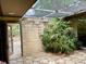 Picturesque courtyard offering a private outdoor space with a ceiling, plants, and serene atmosphere at 246 Ridge Manor Dr, Lake Wales, FL 33853