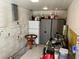 Small kitchen featuring white appliances, cabinetry, and casual dining space at 246 Ridge Manor Dr, Lake Wales, FL 33853