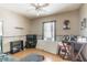 View of the bedroom with blue trim, light walls, and a ceiling fan at 515 New York Ave, St Cloud, FL 34769