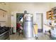 Practical kitchen with stainless steel appliances, including a refrigerator, and ample open space at 515 New York Ave, St Cloud, FL 34769