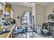 View of the kitchen with dirty countertops, dated appliances and cluttered space at 515 New York Ave, St Cloud, FL 34769