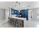Bright and airy kitchen with a central island, modern lighting, and an open layout at 13532 Meadow Bay Loop, Orlando, FL 32824