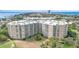 Expansive aerial view of the condominium complex, showcasing its prime location near the beach and beautiful surroundings at 4 Oceans West Blvd # 502B, Daytona Beach, FL 32118