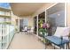 Cozy balcony featuring comfortable seating and a delightful array of potted plants, perfect for relaxation at 4 Oceans West Blvd # 502B, Daytona Beach, FL 32118