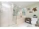 Well-lit bathroom featuring a soaking tub, separate shower, and contemporary fixtures at 4 Oceans West Blvd # 502B, Daytona Beach, FL 32118