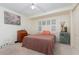 Bedroom featuring natural light with a ceiling fan and neutral decor for a peaceful ambiance at 4 Oceans West Blvd # 502B, Daytona Beach, FL 32118