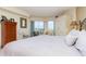 Bedroom boasting natural light, storage and an outside view for a calming space at 4 Oceans West Blvd # 502B, Daytona Beach, FL 32118