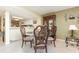 Charming dining space adjacent to a modern white kitchen, perfect for casual meals at 4 Oceans West Blvd # 502B, Daytona Beach, FL 32118