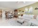 Inviting living room with a dining area, tile floors, and access to a contemporary kitchen at 4 Oceans West Blvd # 502B, Daytona Beach, FL 32118