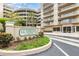 Attractive community signage and landscaping welcomes you to Cloverleaf North Condominiums at 4 Oceans West Blvd # 502B, Daytona Beach, FL 32118