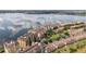 Stunning aerial view showcases lakeside condos, a sprawling community and breathtaking water views at 8749 The Esplanade # 6, Orlando, FL 32836