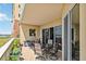 Inviting balcony with comfortable seating and views of the surrounding neighborhood at 8749 The Esplanade # 6, Orlando, FL 32836