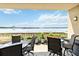 Spacious balcony overlooking a serene lake, perfect for outdoor relaxation at 8749 The Esplanade # 6, Orlando, FL 32836