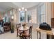 Cozy breakfast nook bathed in natural light, perfect for morning coffee or casual dining at 8749 The Esplanade # 6, Orlando, FL 32836