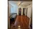 Flex room with hardwood floors with daybed, full shelves, and closet at 15824 Green Cove Blvd, Clermont, FL 34714