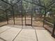 A screened-in patio with a view of the outdoors at 15824 Green Cove Blvd, Clermont, FL 34714