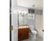 Neutral bathroom featuring wood vanity and shower/tub combo at 8166 Sw 80Th Ter, Ocala, FL 34476