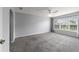 Spacious bedroom with neutral tones and a large window offering ample natural light at 8166 Sw 80Th Ter, Ocala, FL 34476