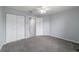 Bedroom featuring neutral walls, ceiling fan, and closet at 8166 Sw 80Th Ter, Ocala, FL 34476