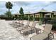 Lounge chairs and private cabanas line the resort style pool deck, perfect for relaxation and enjoying the community atmosphere at 8166 Sw 80Th Ter, Ocala, FL 34476