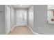 Inviting foyer featuring wood-look floors and neutral paint at 8166 Sw 80Th Ter, Ocala, FL 34476