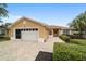 Charming single-story home featuring a two-car garage, landscaped front yard, and inviting entrance at 8166 Sw 80Th Ter, Ocala, FL 34476