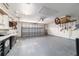 Spacious garage features ample storage, work bench, and overhead door at 8166 Sw 80Th Ter, Ocala, FL 34476