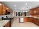 Open kitchen offers stainless steel appliances and plenty of counter space for cooking at 8166 Sw 80Th Ter, Ocala, FL 34476