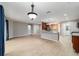 Spacious living area with lots of natural light, wood flooring, and an open floor plan at 8166 Sw 80Th Ter, Ocala, FL 34476