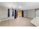 Sunlit living space featuring sliding glass doors to the backyard at 8166 Sw 80Th Ter, Ocala, FL 34476