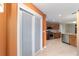 View of the kitchen through the pantry doors in this well-appointed home at 8166 Sw 80Th Ter, Ocala, FL 34476