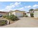 Lovely home with a well-kept front yard and a two-car garage in a friendly neighborhood at 1787 Foliage Ln, The Villages, FL 32162
