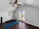 Bright exercise room with wood floors and access to a balcony at 6567 Eagle Ridge Way, Lakeland, FL 33813
