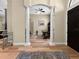 Welcoming foyer boasting wood floors, columns, archway, and views into the dining and living areas at 6567 Eagle Ridge Way, Lakeland, FL 33813