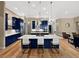 Kitchen featuring pendant lights over island with bar seating and stainless steel appliances at 6567 Eagle Ridge Way, Lakeland, FL 33813