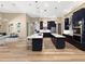 Spacious kitchen with double islands, breakfast nook, and seamless flow to dining area at 6567 Eagle Ridge Way, Lakeland, FL 33813
